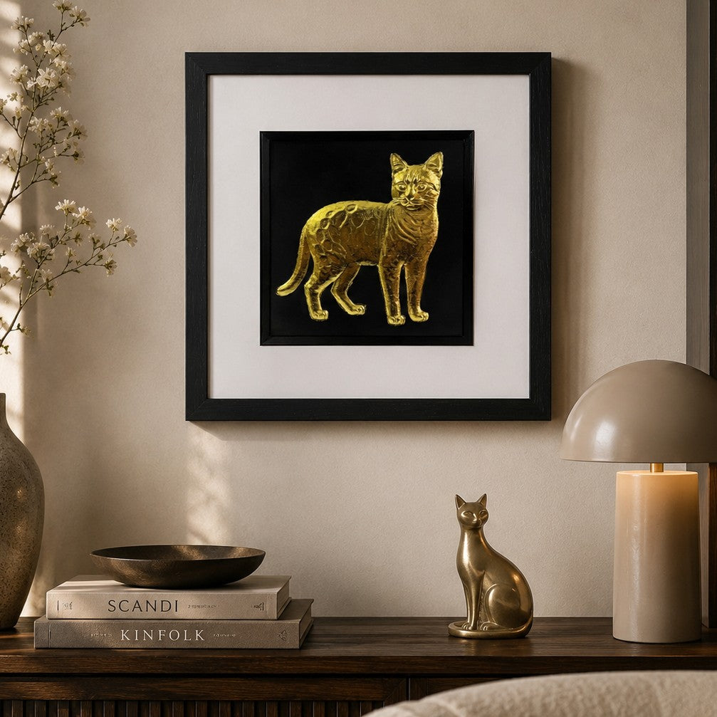 Framed Bengal cat wall art with gold leaf cat design on a black background, styled in a warm neutral living room for premium cat home decor.