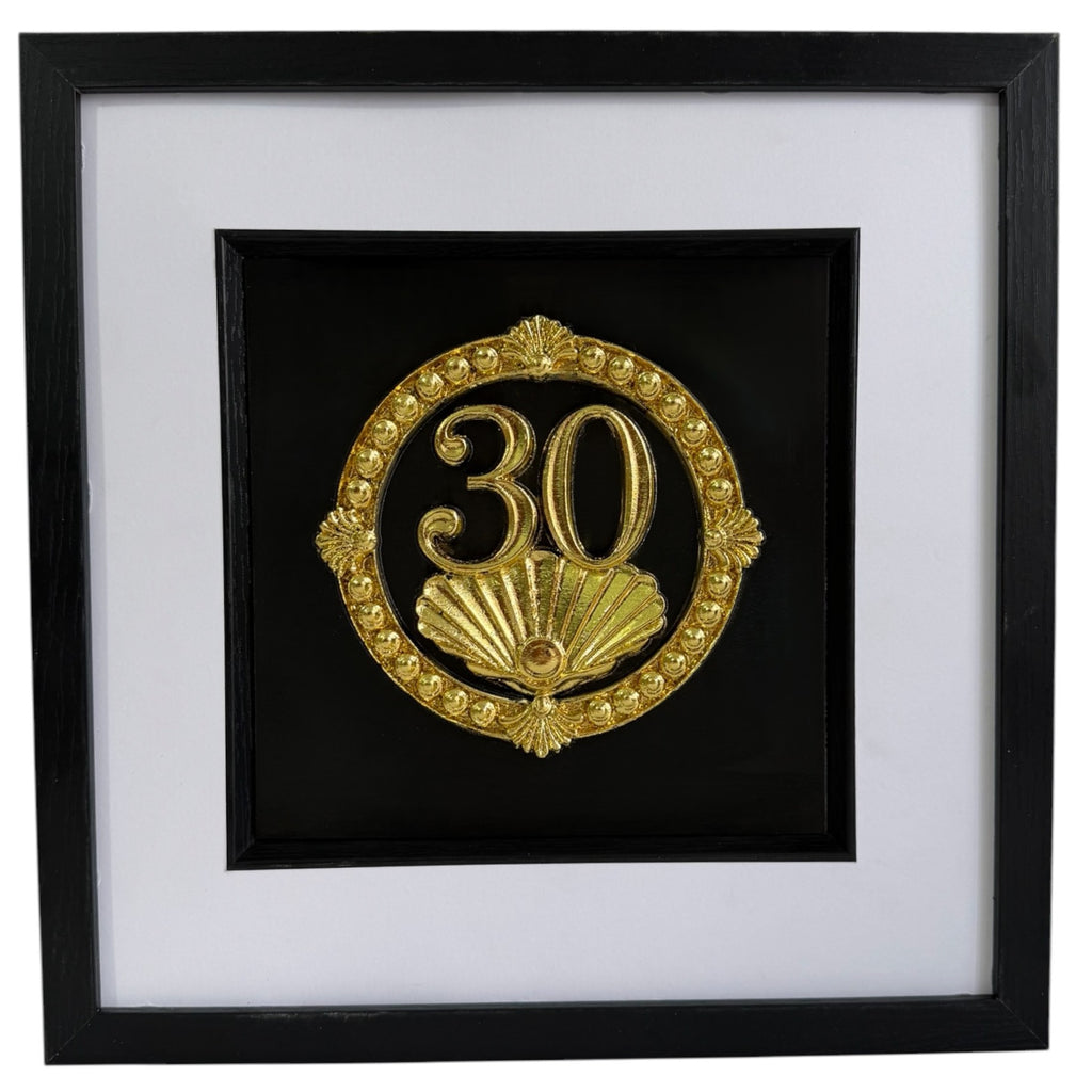 Straight-on Gold 30th anniversary pearl shell framed artwork with raised number 30, pearl-style border, shell detail, and black background.
