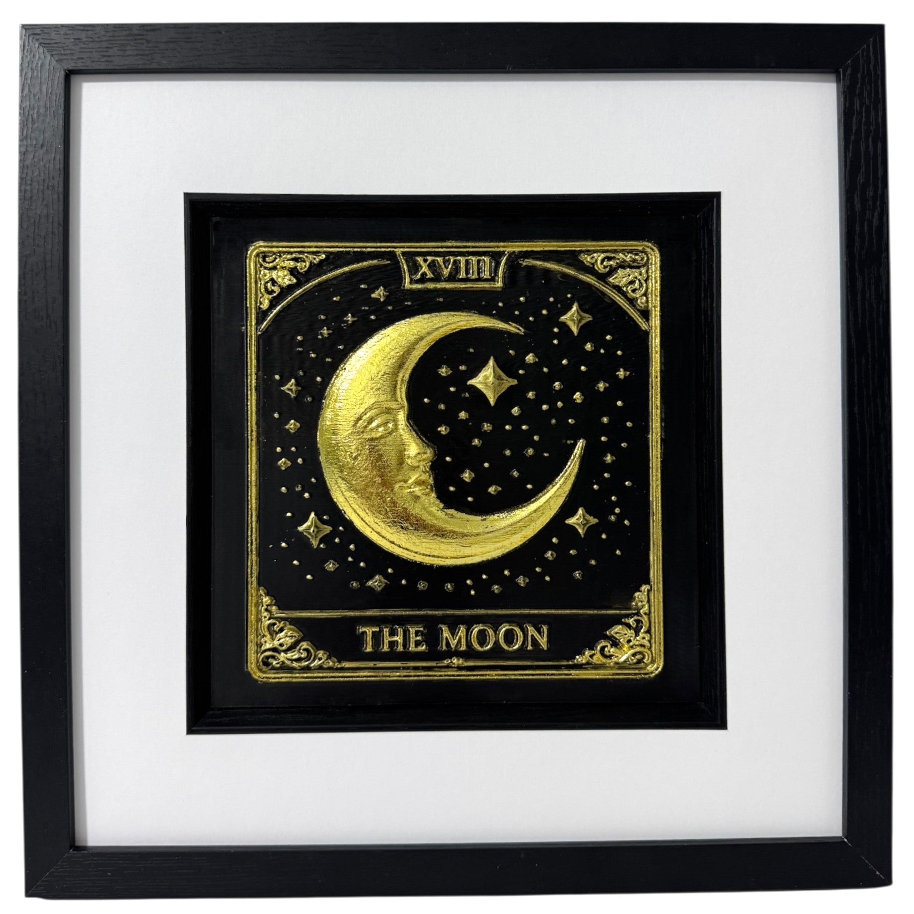 Front view The Moon tarot card wall art in gold leaf, crescent moon face and starry sky in raised 3D relief with XVIII and THE MOON text