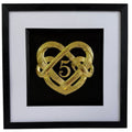 Gold framed 5th wedding anniversary heart knot artwork with central number 5, black box frame, white mount, and black inner surround.