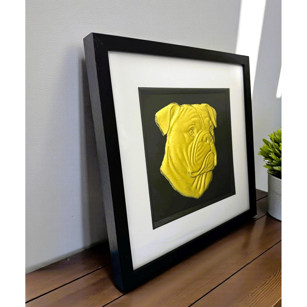 American Bulldog framed wall art featuring a raised gold leaf dog portrait in a black frame photographed at an angle