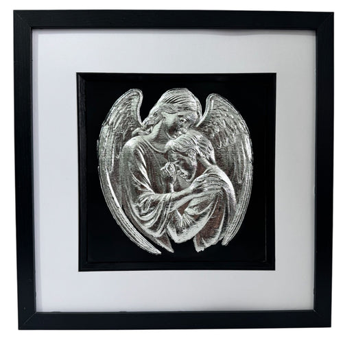 Silver leaf angel embracing a human figure framed in black wood with white mount on a black background