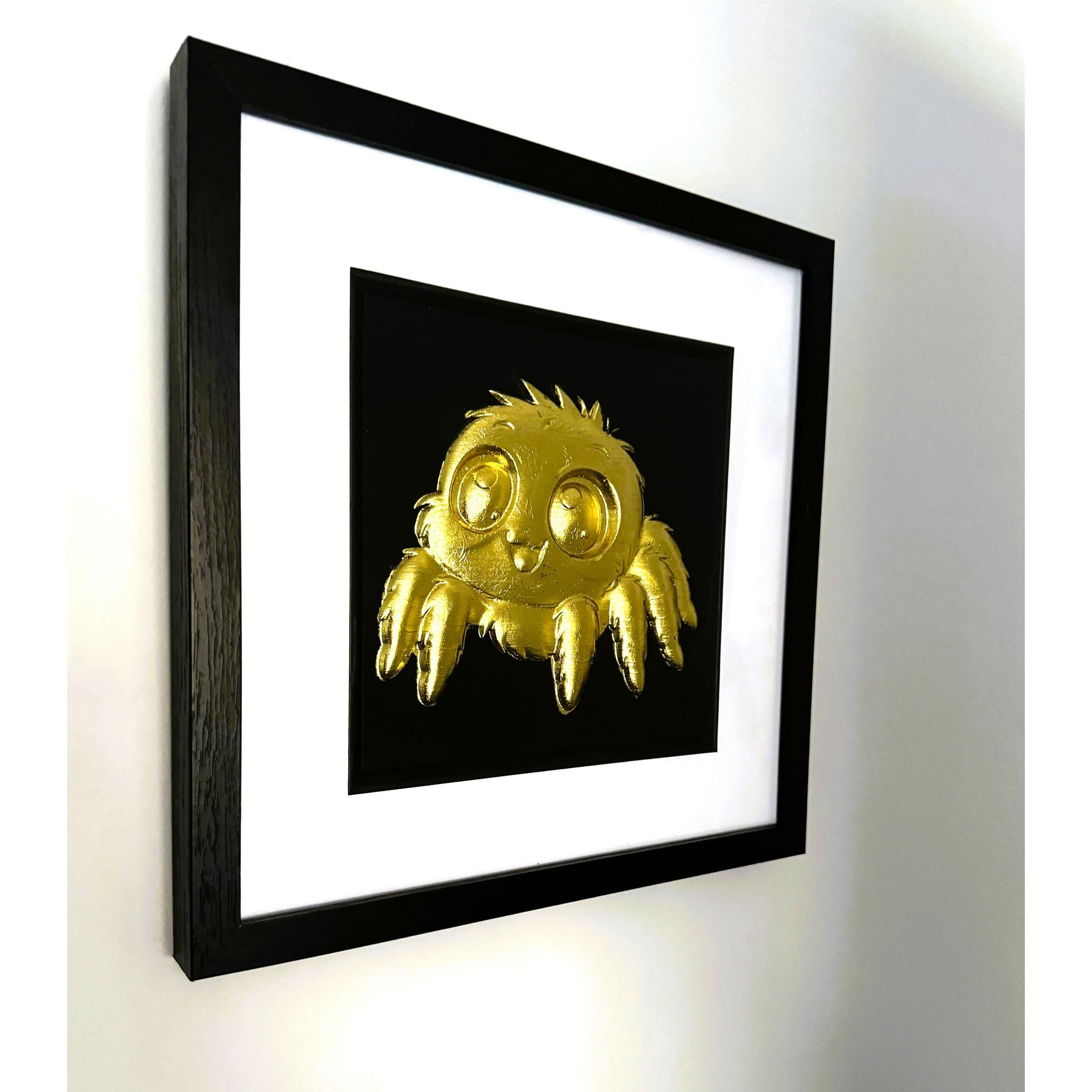 Side view of framed jumping spider wall art on a wall showing the box frame depth and white mount
