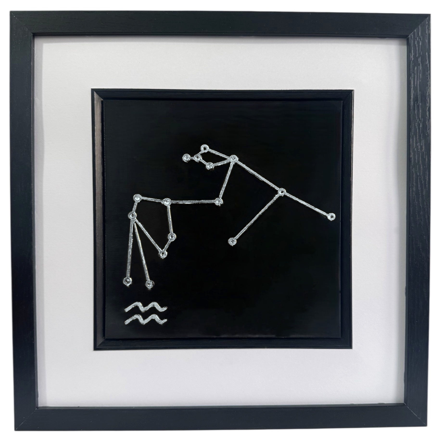 Silver Aquarius constellation wall art framed in black with white mount, raised relief zodiac constellation on a black background