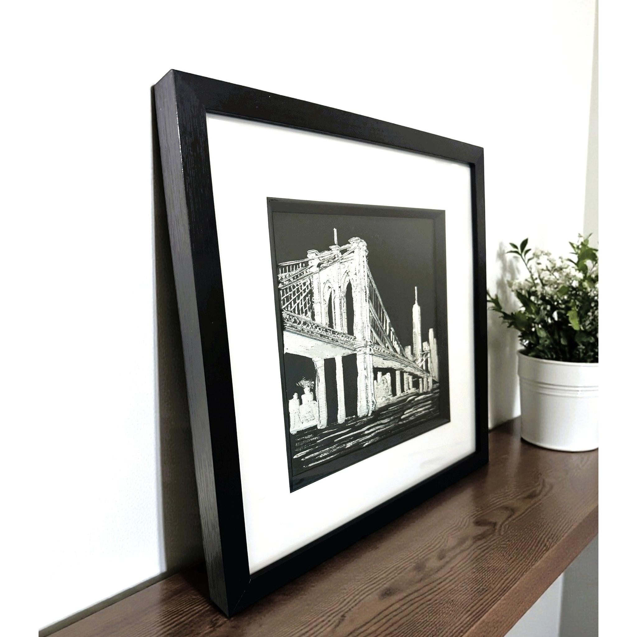 Close view of Brooklyn Bridge landmark artwork on black background