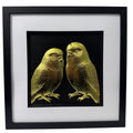 Front view of gold leaf budgie pair 3D relief artwork on black background with inner black surround and white mount