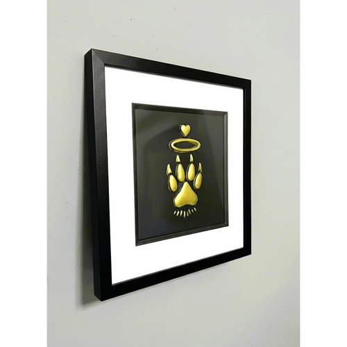 Cat Paw Halo framed wall art displayed on wall in black frame with white mount