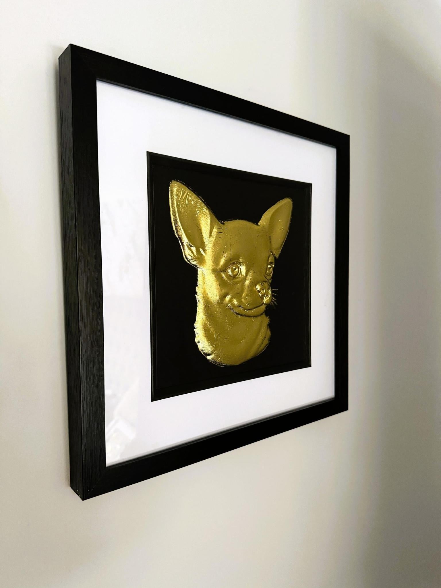 Short-haired Chihuahua gold leaf framed wall art displayed on a wall interior