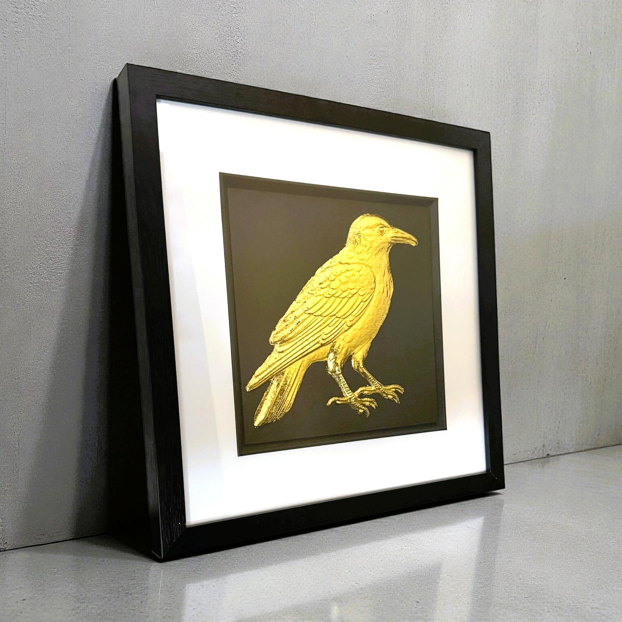 Gold leaf crow framed wall art shown on a shelf, highlighting frame depth