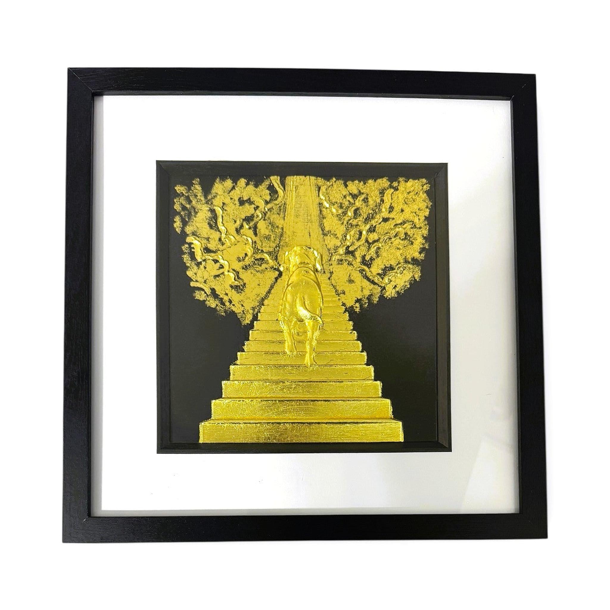Front view of Dog Stairway to Heaven gold leaf framed wall art in black frame white mount