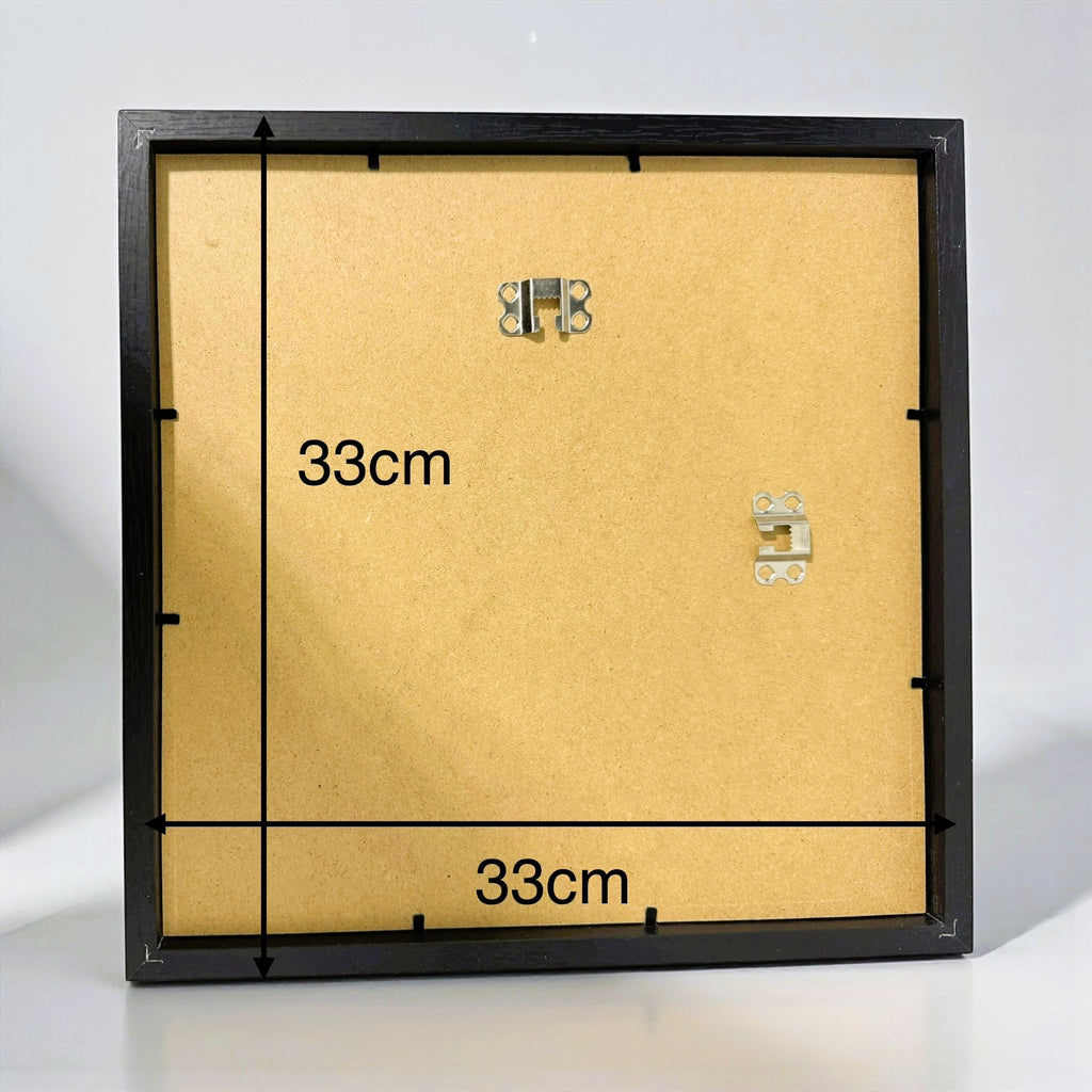 Back of the JP Designs wall art frame showing fitted hanging fixings and 33 cm frame dimensions