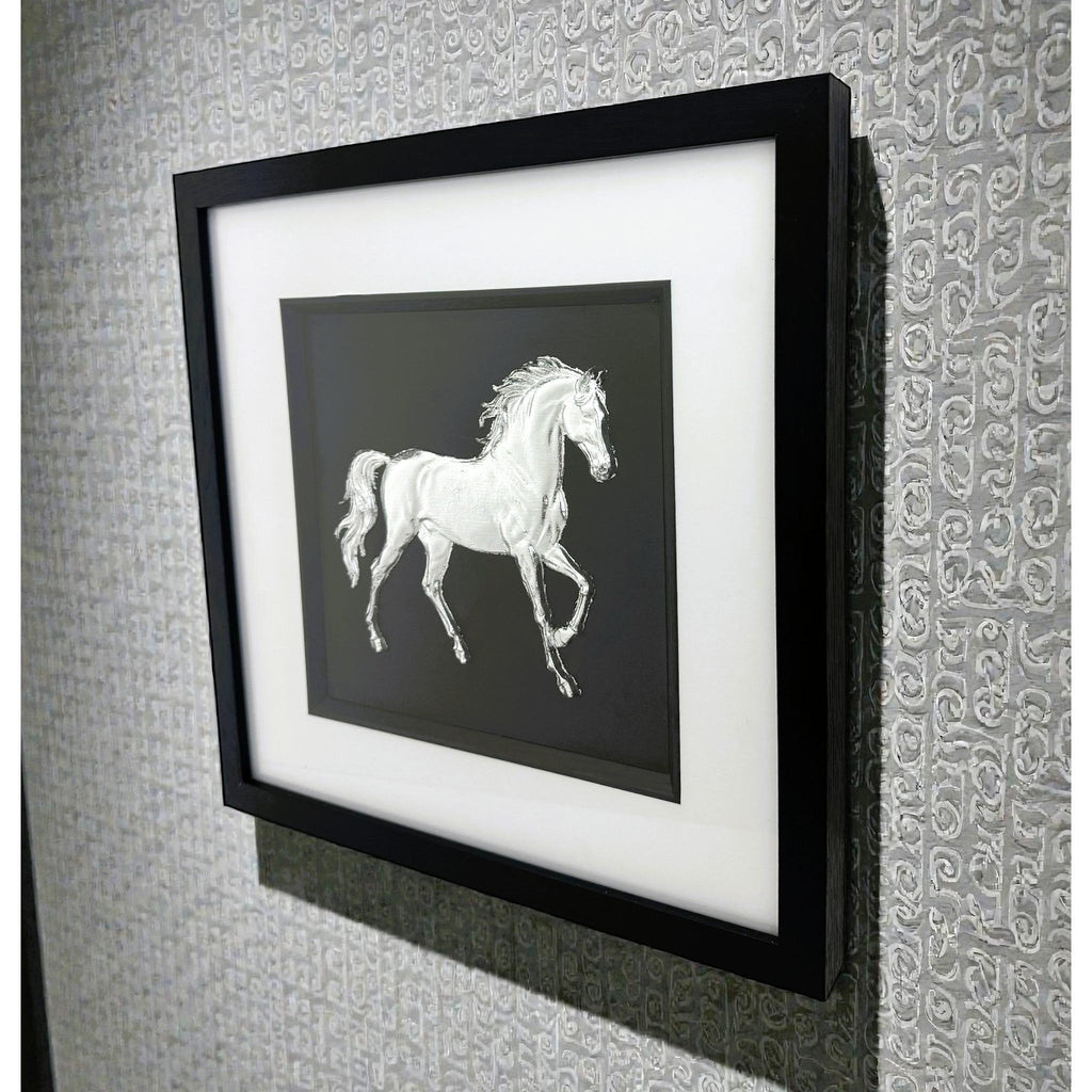 Silver horse wall art shown from an angled wall view