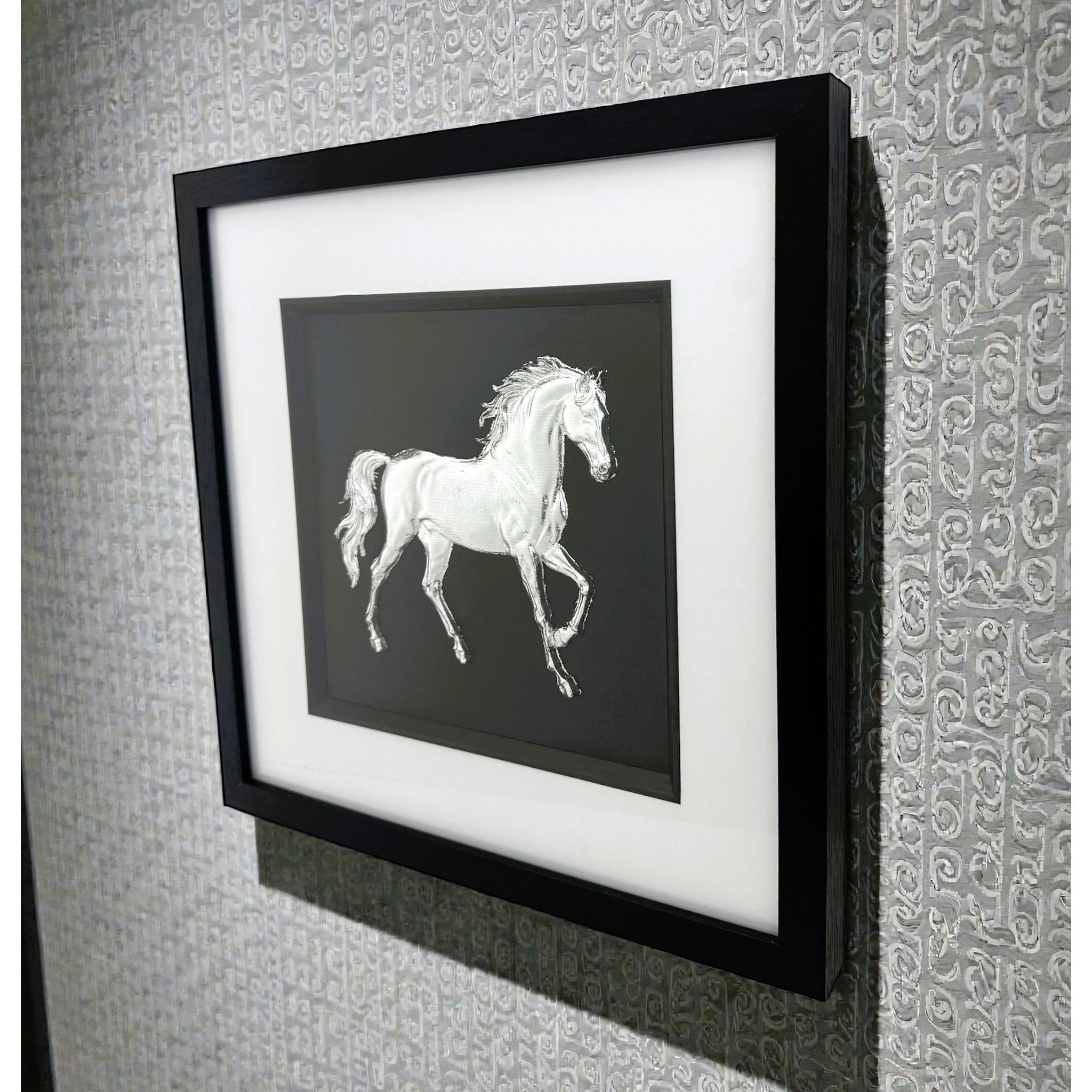 Silver horse wall art shown from an angled wall view