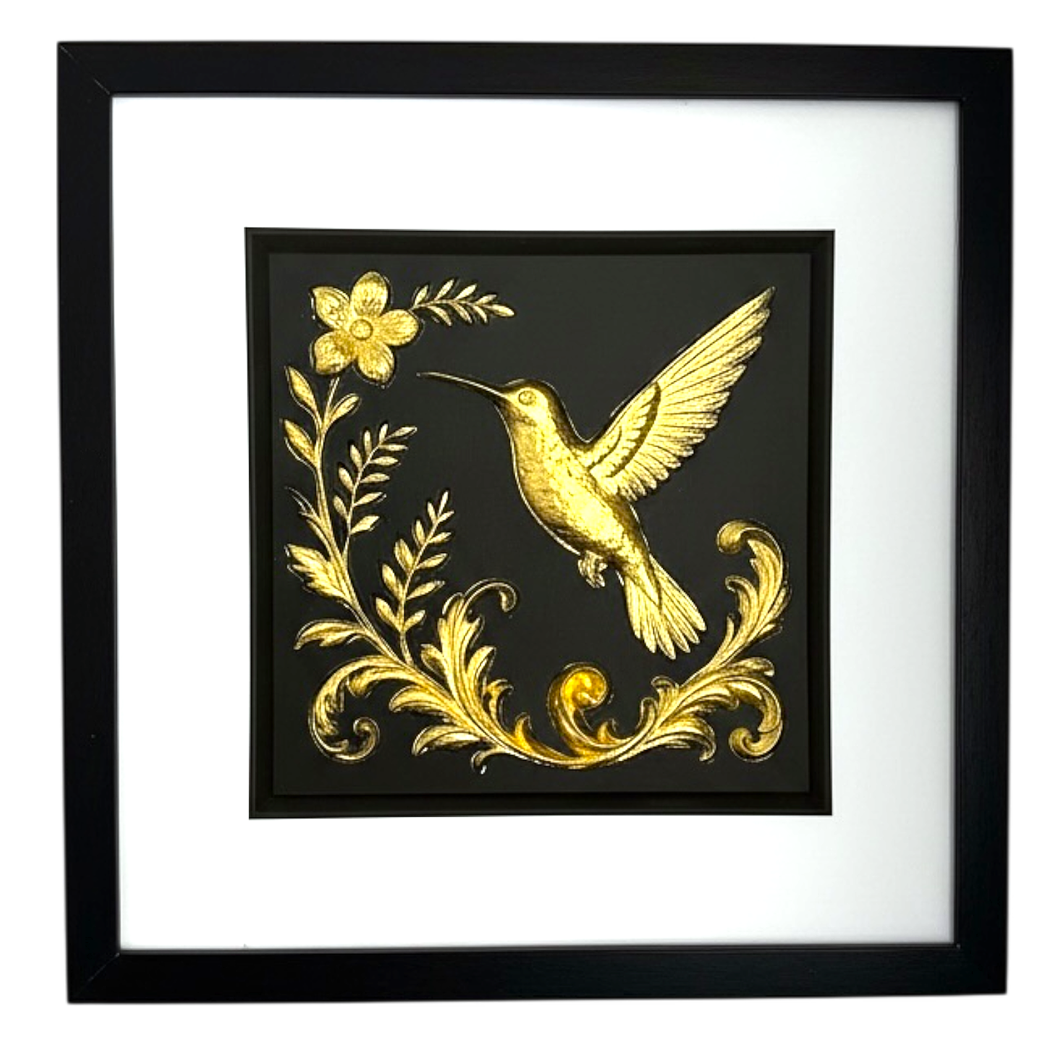 Front-facing gold leaf hummingbird in flight framed artwork on black background
