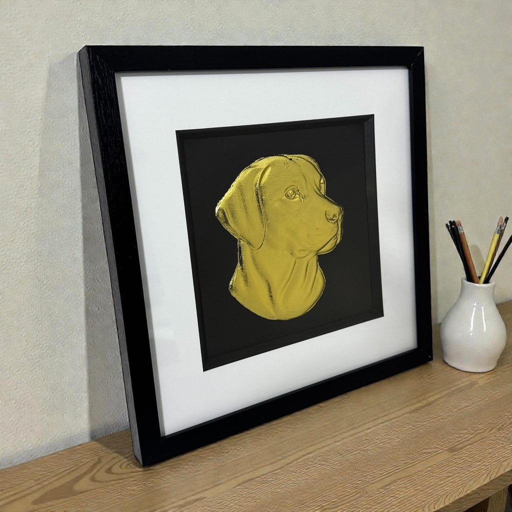 Labrador Retriever framed 3d wall art in gold leaf viewed at an angle, displayed in a black wooden frame with white mount