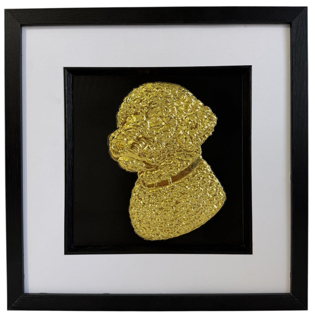 Front view of a gold Lagotto Romagnolo relief portrait in a square black frame with a wide white mount and black inner surround.