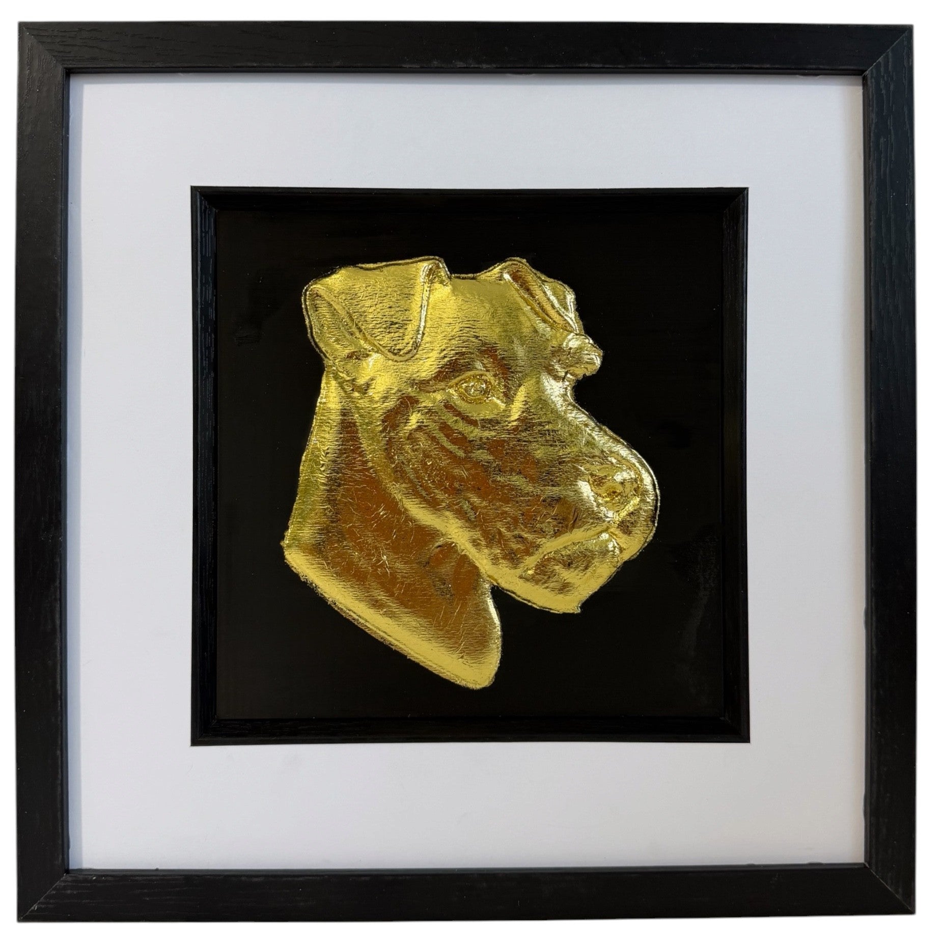 Lakeland Terrier framed wall art showing a sculpted dog portrait in gold leaf, set on a black background with white mount and black wooden frame