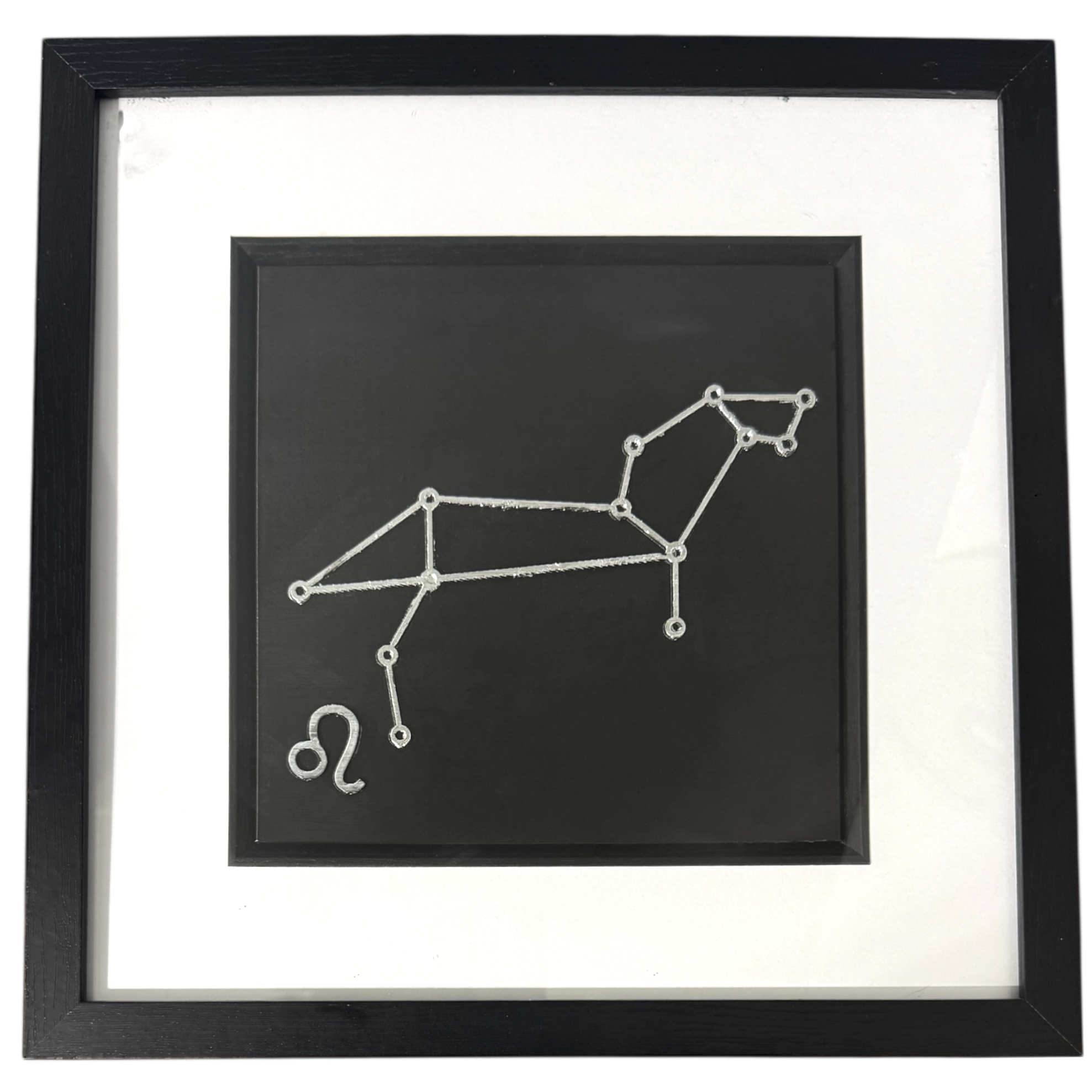 Silver Leo constellation wall art on black background with white mount