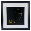 Gold Libra constellation wall art framed in black with white mount, raised relief Libra zodiac constellation on a black background