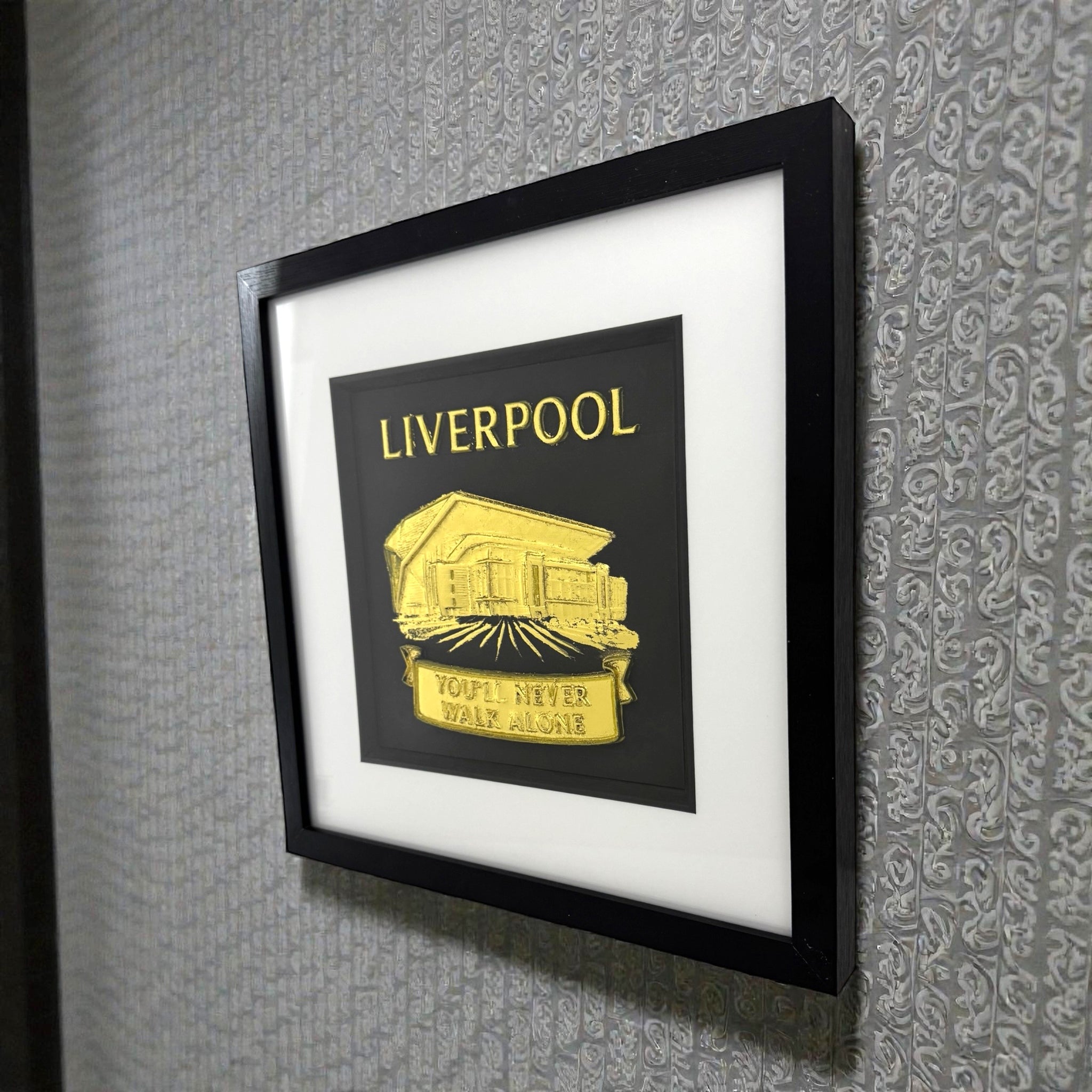 Close up of raised 3D You'll Never Walk Alone banner on Liverpool wall art.