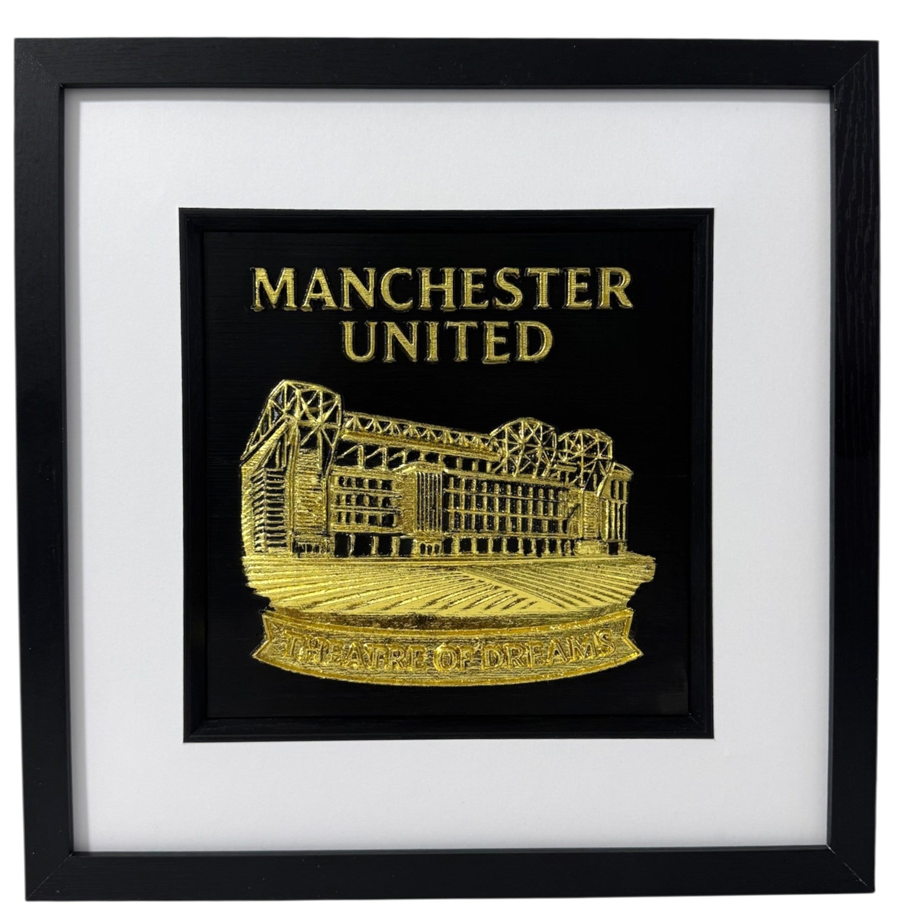 Manchester United gold relief framed wall art with stadium illustration and “Theatre of Dreams” wording, black frame and white mount, gift for football fans.