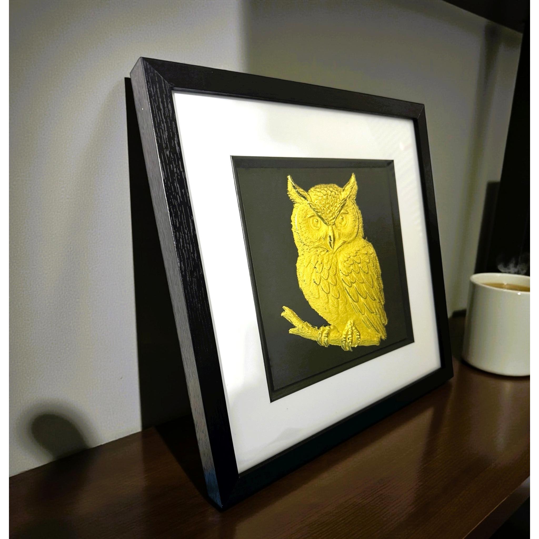 Gold leaf owl framed wall art showing frame depth and side profile on wooden surface