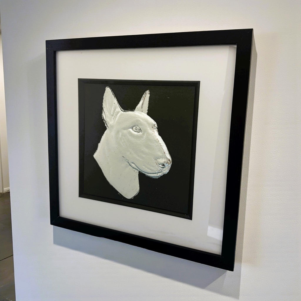 Silver leaf english bull terrier wall art hanging on a wall in a black frame with gold leaf finish by JP Designs
