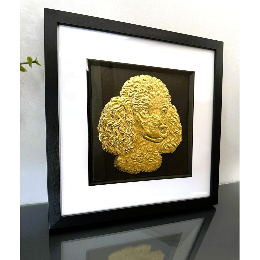 Poodle dog wall art displayed on a desk in a black frame with gold leaf finish by JP Designs