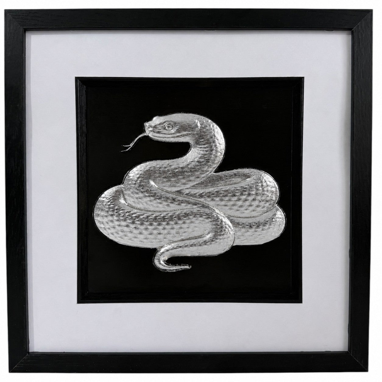 Silver framed snake relief artwork with black centre, white mount, black square frame and glass front.