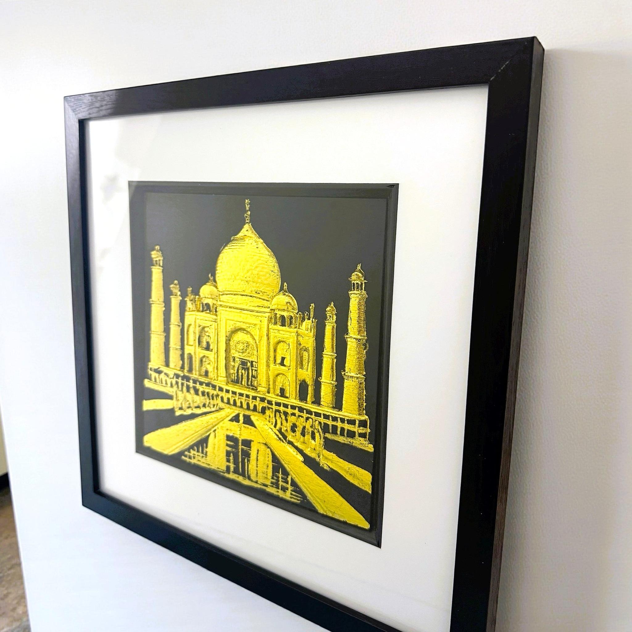 Angled view of Taj Mahal framed wall art on a wall