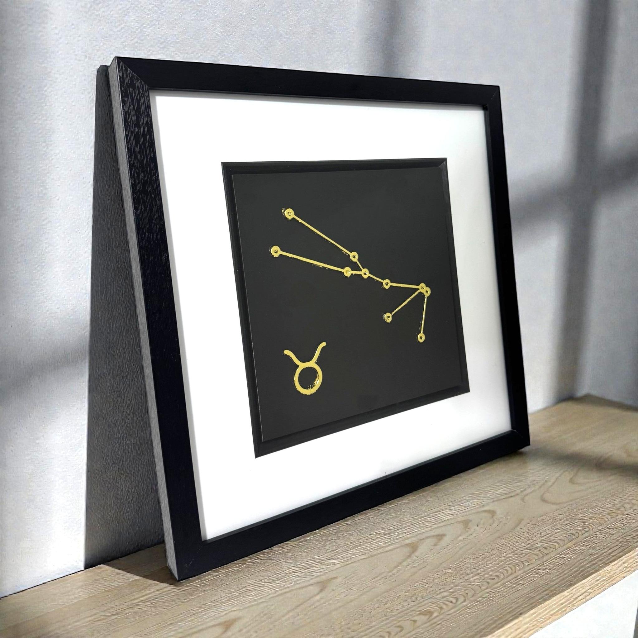 Side view of framed Taurus constellation wall art showing depth
