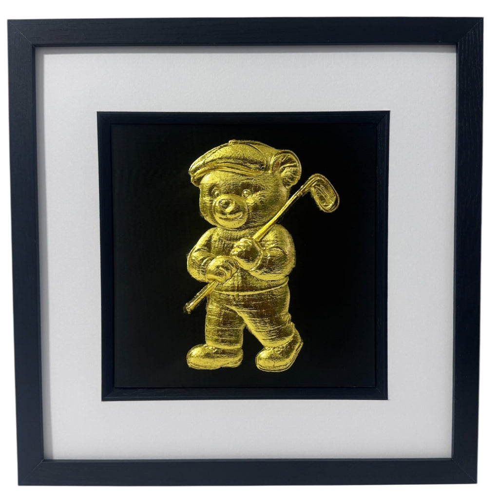 Gold 3D relief wall art of cute teddy bear holding golf club.