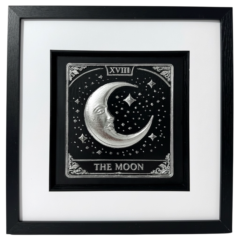 Front view The Moon tarot card wall art in silver leaf, framed black box frame with white mount, crescent moon and stars in 3D relie