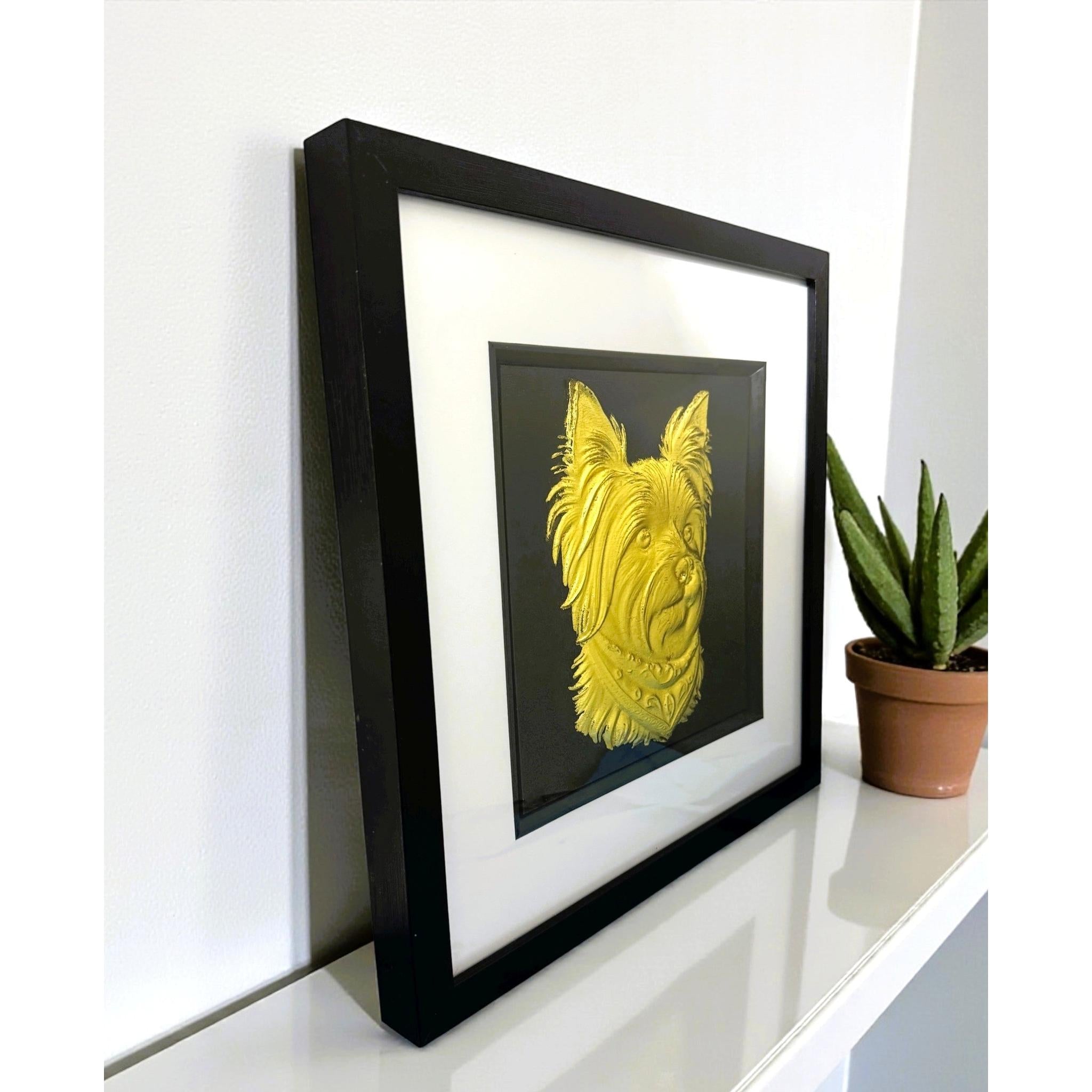 Yorkshire Terrier gold leaf wall art with bandana displayed on desk surface in black frame