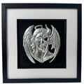 Angel and demon face wall art framed in black with silver leaf relief