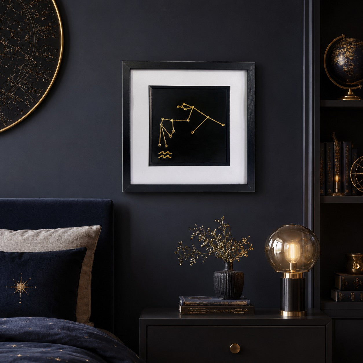 Aquarius constellation framed wall art in gold displayed on a dark bedroom wall with celestial decor, navy bedding, warm lighting and gold accents.