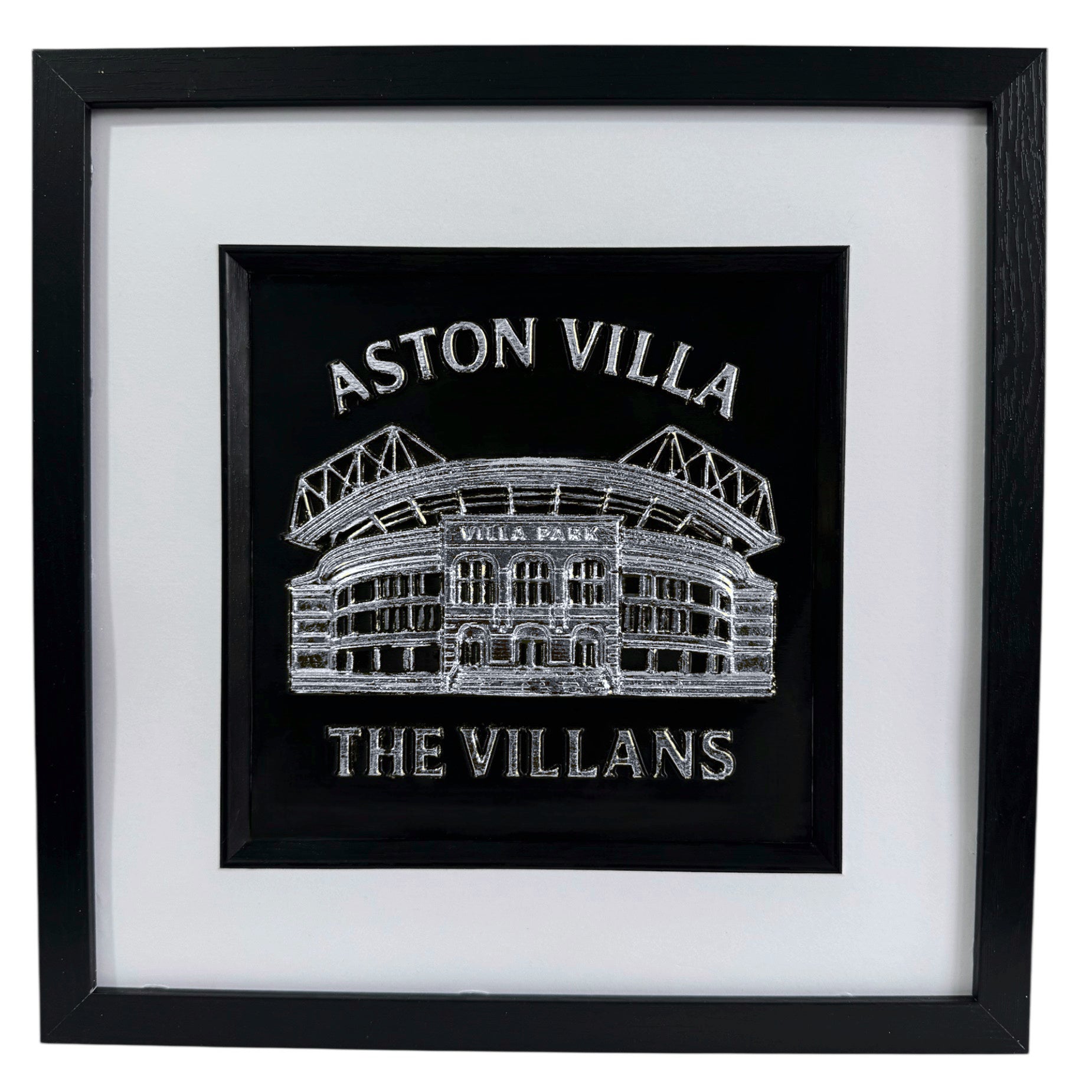 Silver 3D relief wall art of Aston Villa Villa Park stadium on black background.