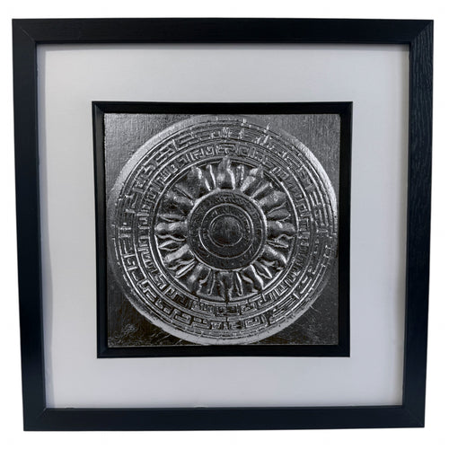 Front-facing silver leaf Aztec Sunstone framed wall art with circular layered detail