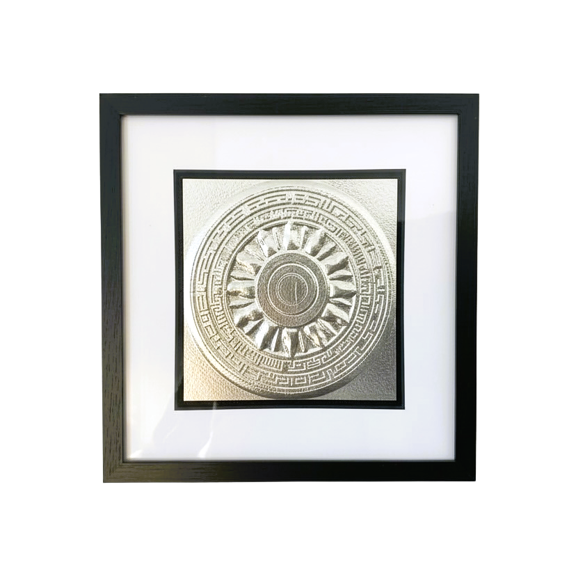 Front-facing silver leaf Aztec Sunstone framed wall art with circular layered detail