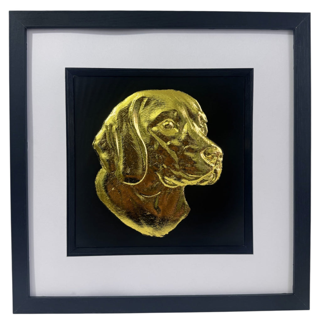 Framed beagle wall art with gold relief portrait on a black background, presented in a black frame with white mount on a clean white background