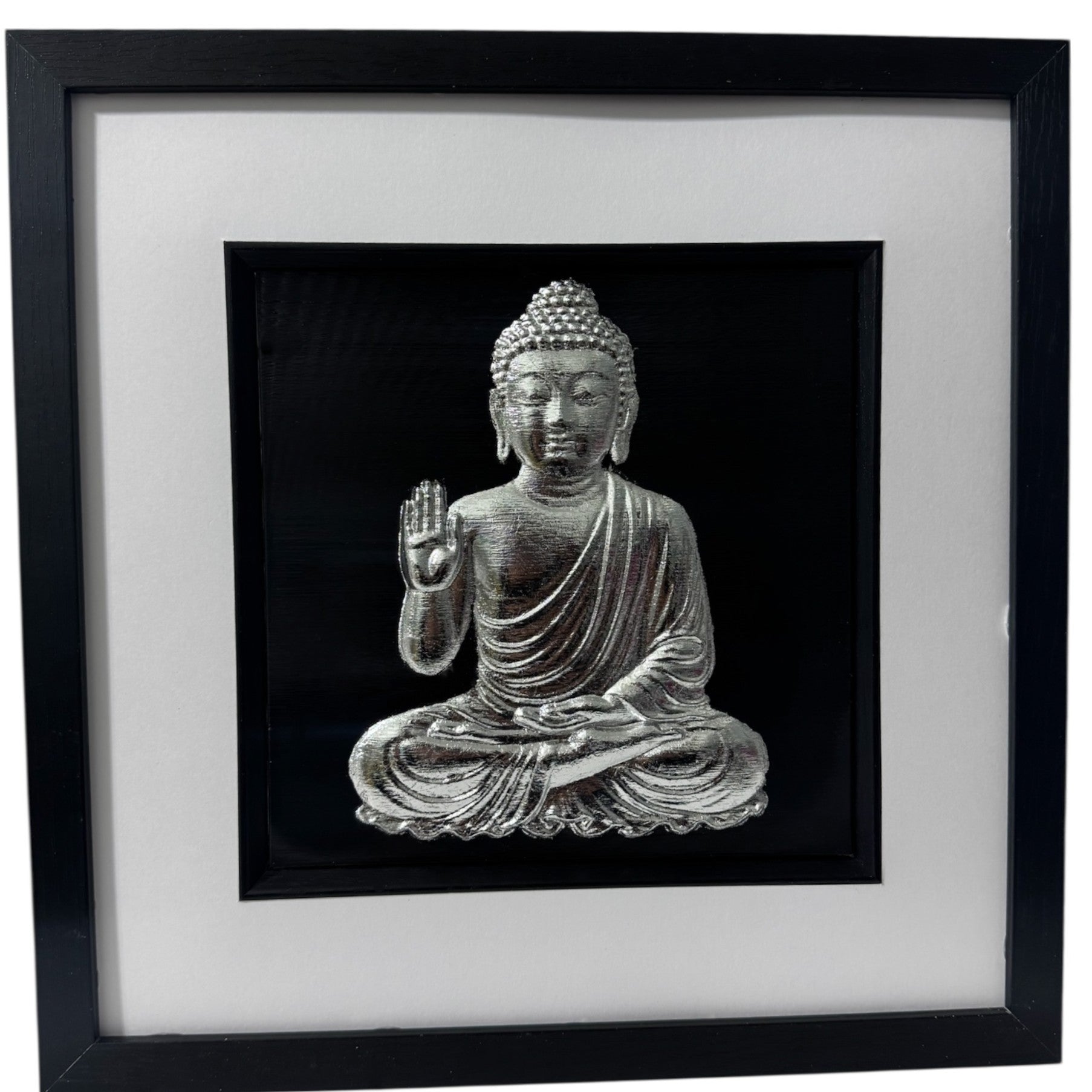 Front-facing silver leaf Buddha wall art centred on a black background
