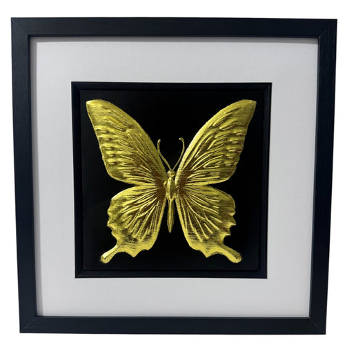 gold leaf butterfly artwork on black background
