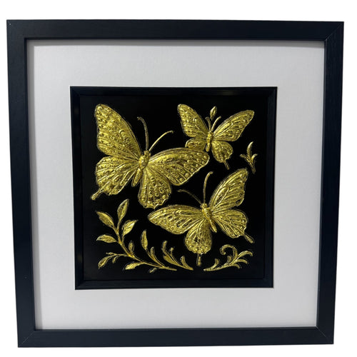 Butterfly trio framed wall art in gold leaf with black background and white mount