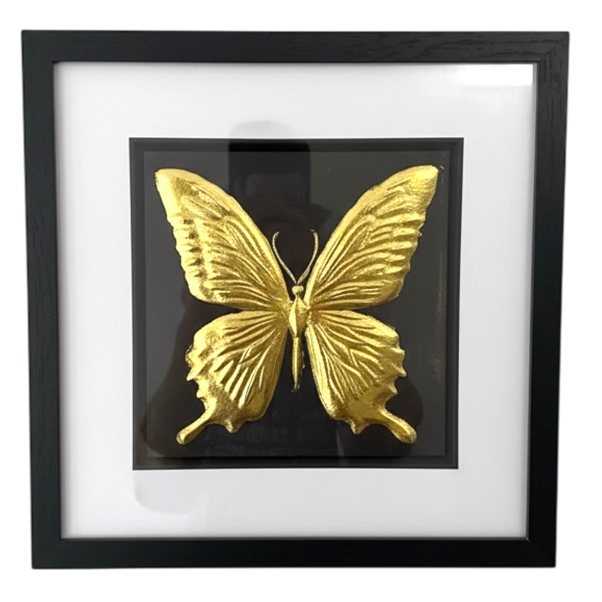 gold leaf butterfly artwork on black background