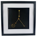 Framed Cancer constellation 3d wall art in gold leaf with star pattern and zodiac symbol, centred on a black background with white mount and black frame