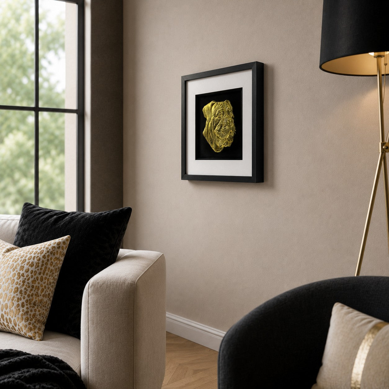 Angled lifestyle view of Cane Corso gold 3D dog wall art in a black frame with white mount, styled in a modern neutral living room.