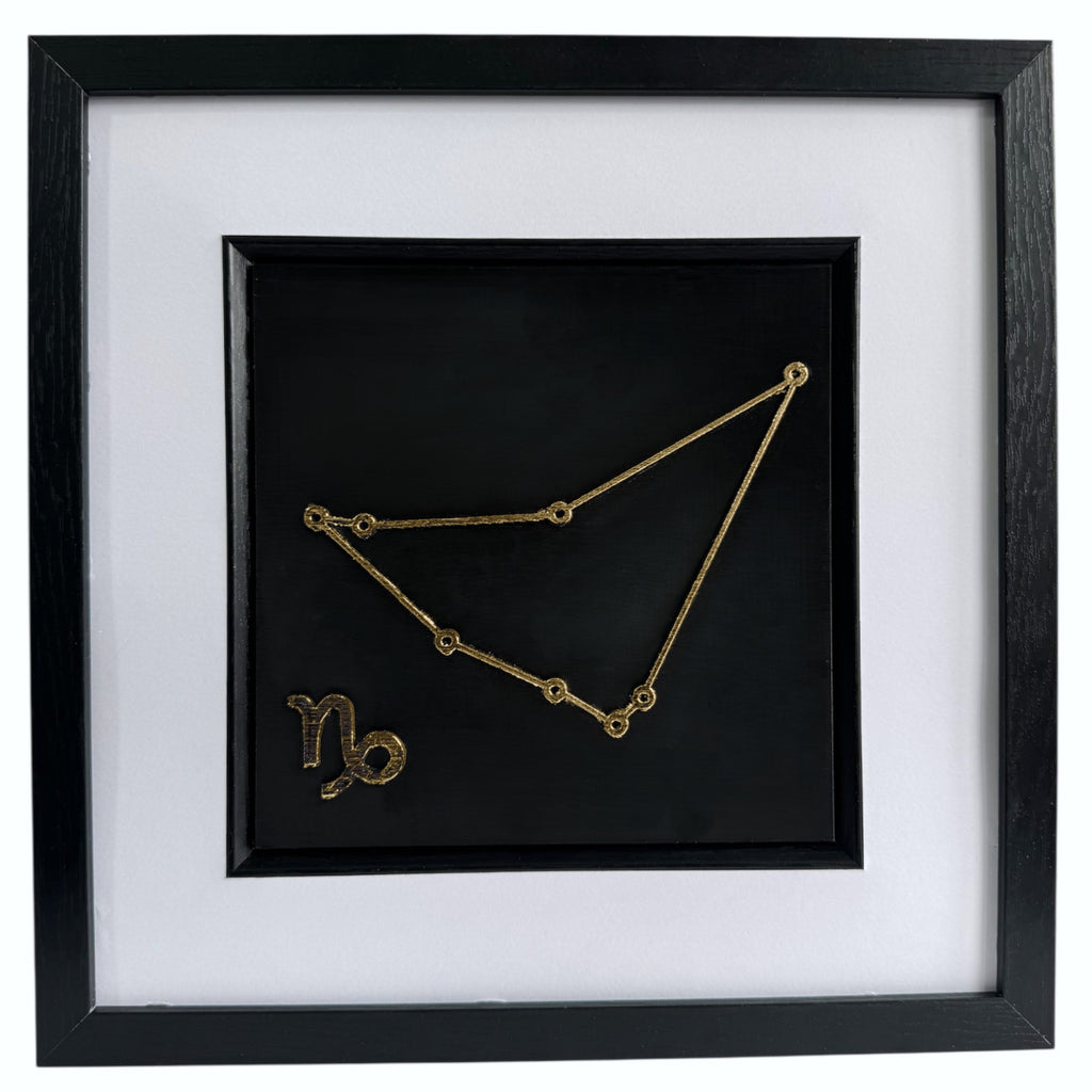 gold Capricorn constellation 3d wall art on black background with white mount