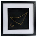 gold Capricorn constellation 3d wall art on black background with white mount