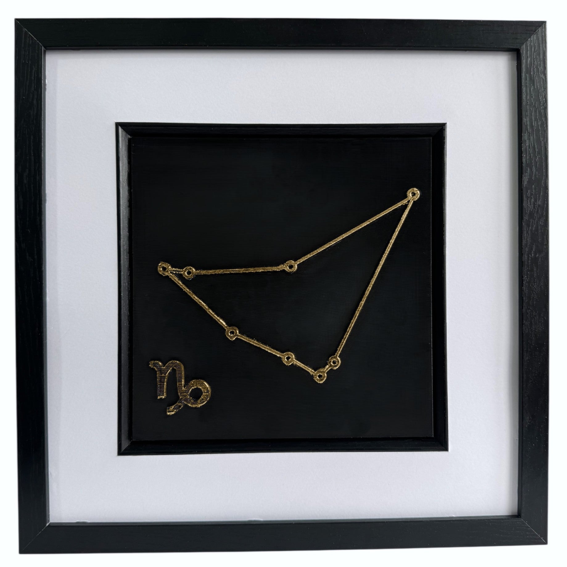 gold Capricorn constellation 3d wall art on black background with white mount