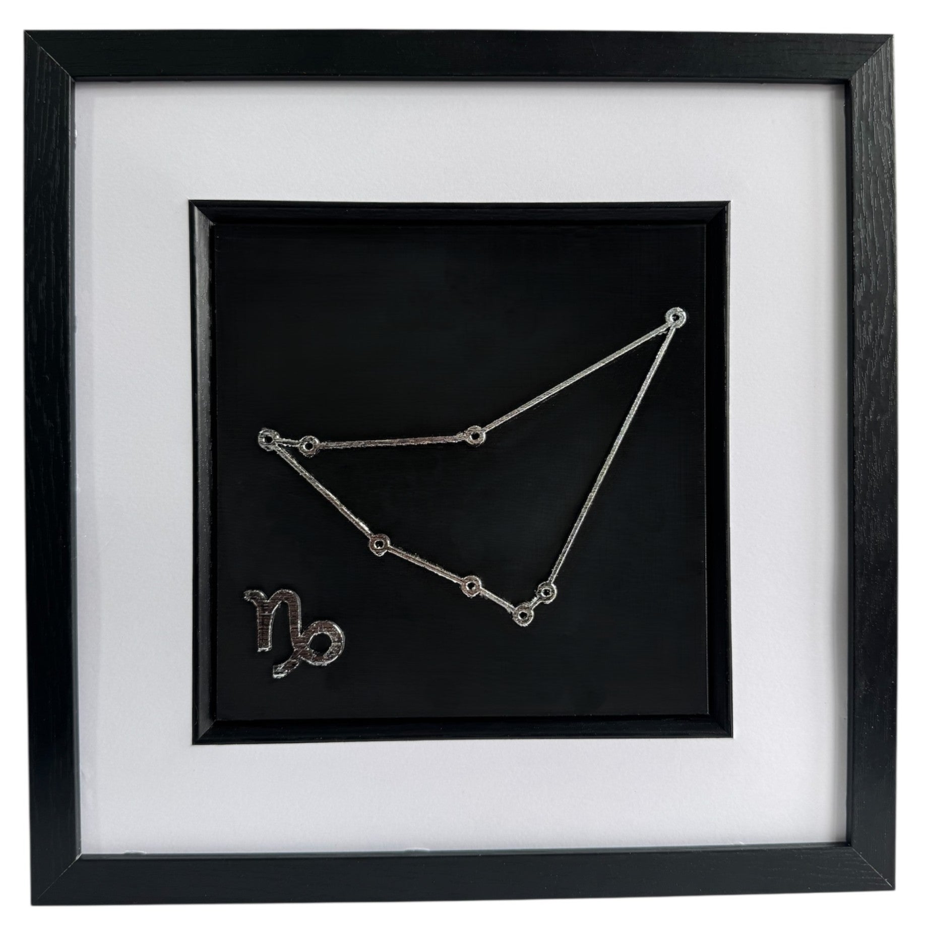 Silver Capricorn constellation 3d wall art on black background with white mount